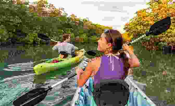 A Couple Kayaking Through A Secluded Cove In The Florida Keys, Surrounded By Lush Mangroves And Crystal Clear Waters. Legend In The Keys: A Logan Dodge Adventure (Florida Keys Adventure 8)